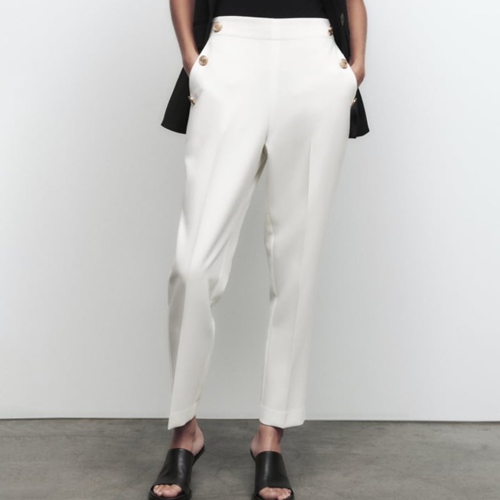 Straight leg pants with metallic buttons